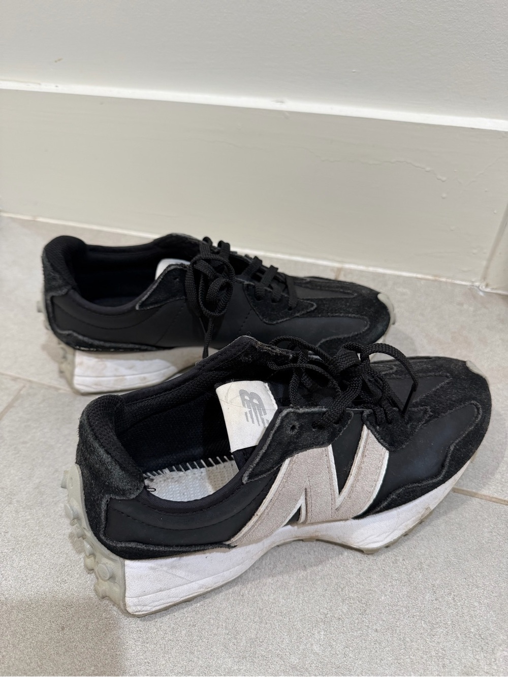 New Balance Women’s Black and White Sneakers
